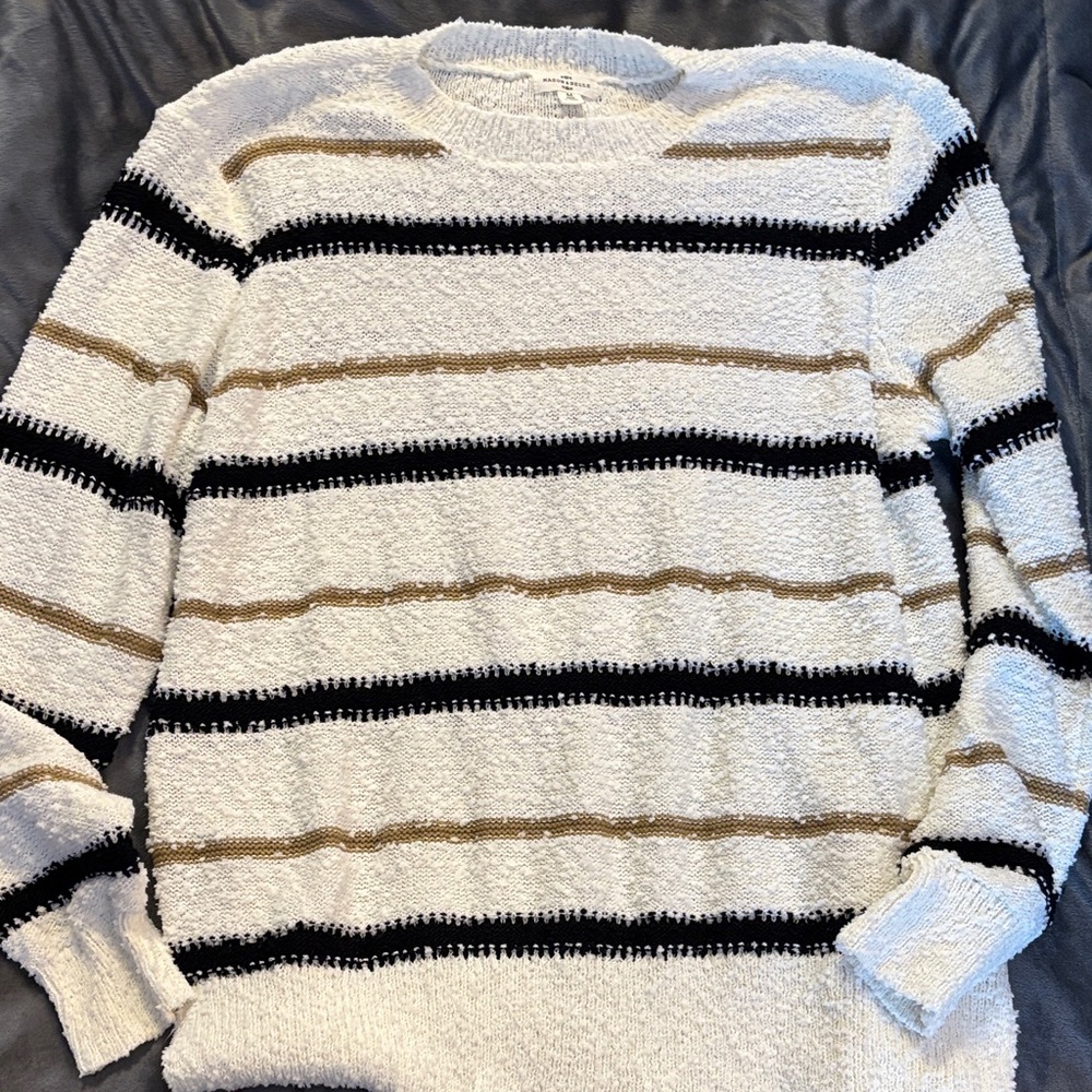 Elegant Striped Sweater in Black, White, and Gold